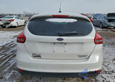 2016 Ford Focus Titanium z USA, uszkodzony, nr VIN 1FADP3N23GL359608